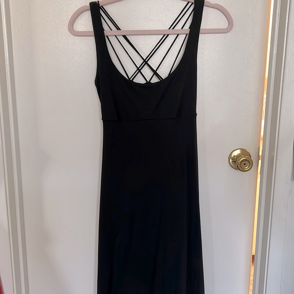 Black strapped back dress.